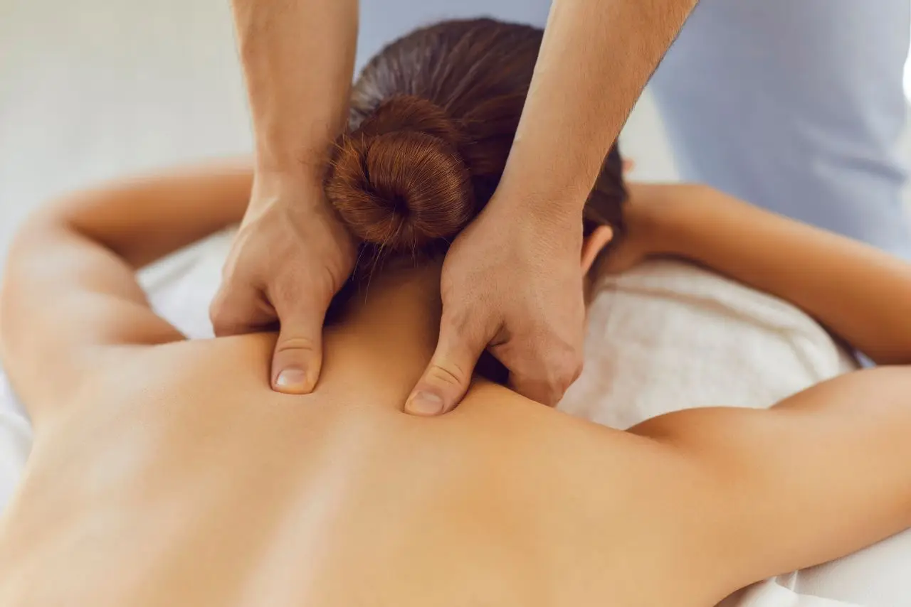 Woman receiving focused neck massage at Best Deep Tissue Massage in Basavanagudi